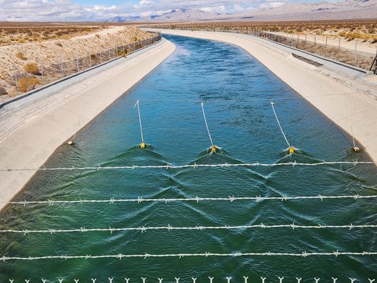 The Colorado River Aqueduct channel carrying blue-green water through the open desert near Vidal.